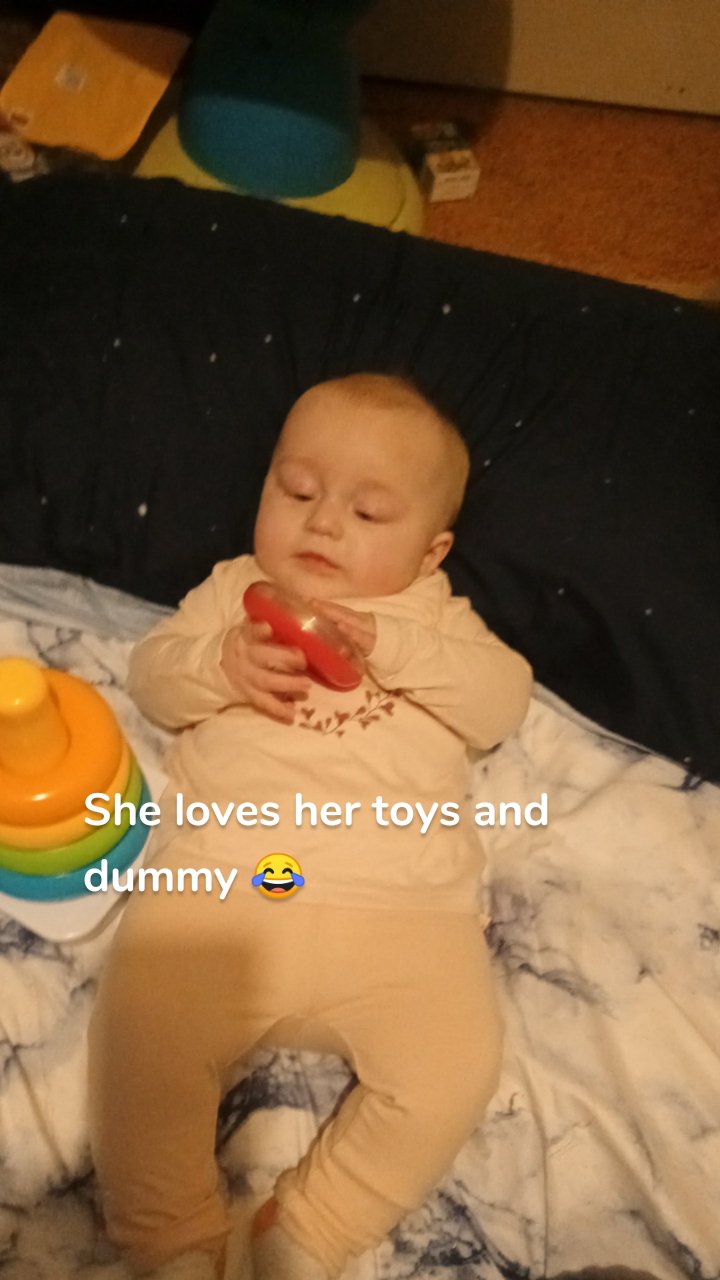 She loves her toys and dummy 😂